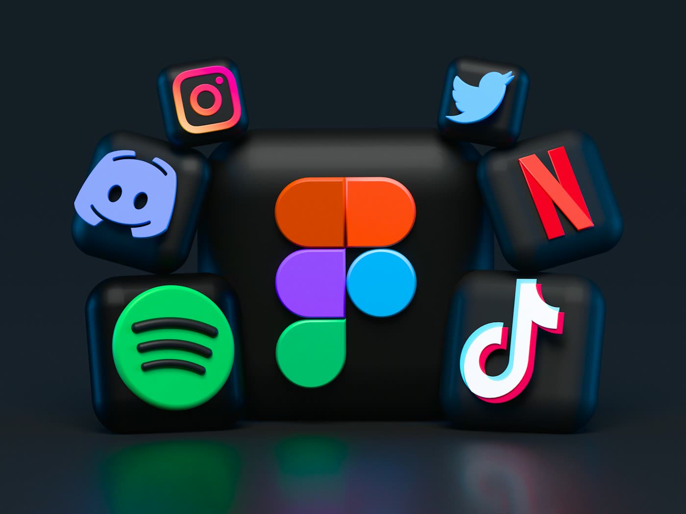 3D icons of social media and streaming apps on dark background